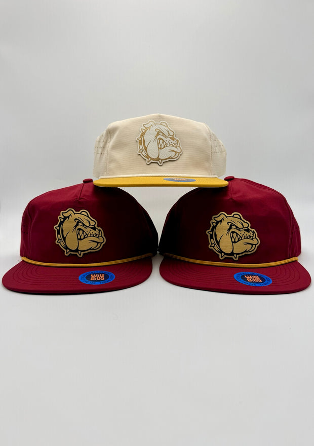 Three custom bulldog hats in cream and maroon